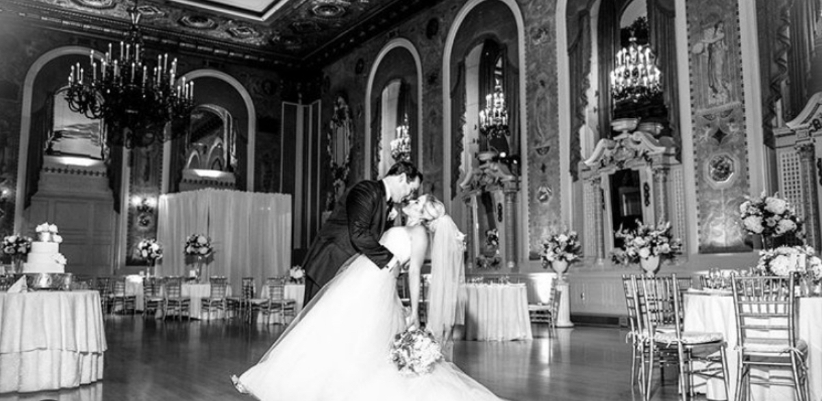 HOTEL DUPONT wedding couple dancing in gold ballroom black and white image