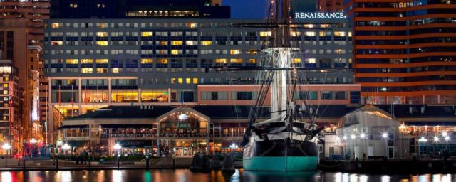 Exterior of RENAISSANCE BALTIMORE HARBORPLACE HOTEL with ship in harbor