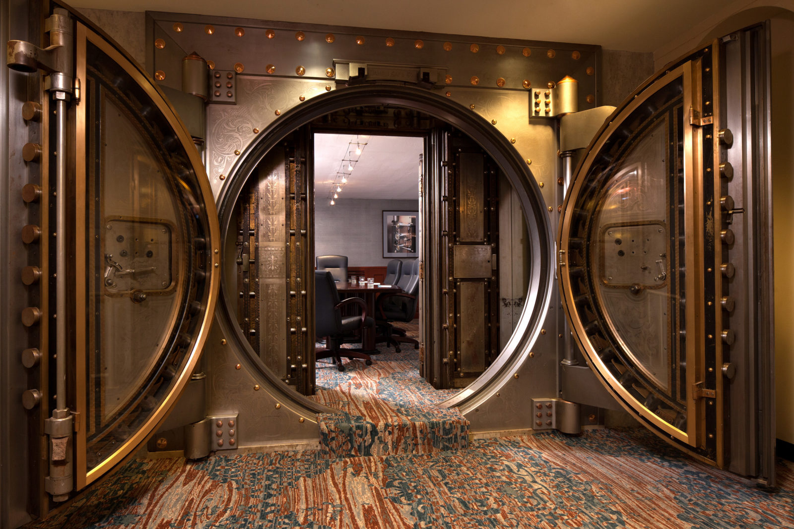 Meeting space through a bank vault design door at Springhill Suites Baltimore Inner Harbor